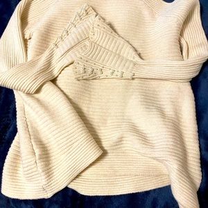 Cream ribbed sweater mock turtleneck pearl accents on bell sleeves. Soft! So L